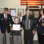 VFW honors Haedyn Horstman's unusual efforts in formal presentation.