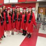 Photo by Kelly Sullivan/ Peninsula Clarion A group of Kenai Central High School's graduating seniors pose for a photo in the school lunchroom before the ceremony begins Tuesday, May 18, 2016, at Kenai Central High School in Kenai, Alaska.