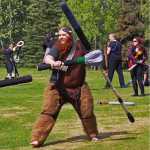 Juanita Williams (left) duels her son Jeremija Williams during the Frozen Coast live-action role play group's weekly battle game on Sunday, May 22 in the Kenai Municipal Park.