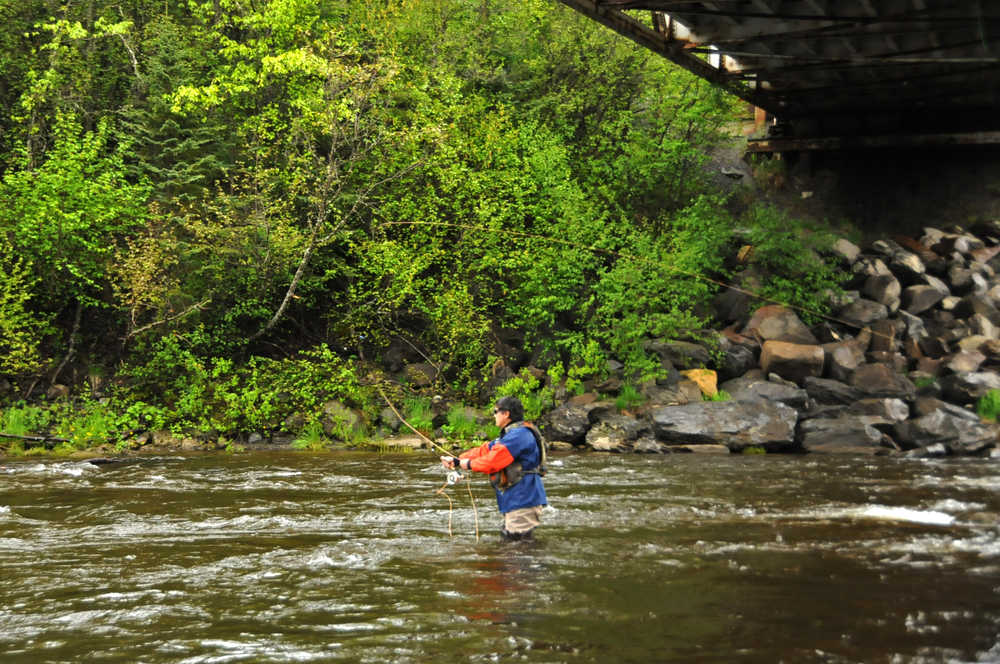 Photo by Elizabeth Earl/Peninsula Clarion Fishermen lined up along the Anchor River near Anchor Point, Alaska, during its first opening day on Saturday, May 21, 2016. The Anchor River is one of the first freshwater rivers in Southcentral Alaska where sportfishermen can go to catch a king salmon.