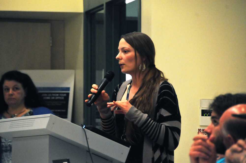 Photo by Elizabeth Earl/Peninsula Clarion Rebecca Morrissey of the Alaskan AIDS Assistance Association spoke to the crowd at the second Heroin Town Hall meeting held at the Challenger Learning Center in Kenai, Alaska on Thursday, May 26, 2016, about the beenfits of a needle exchange for heroin addicts. The AAAA has run one in Anchorage since 2007, she said.