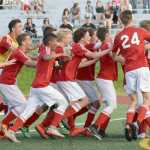 Photo by Joey Klecka/Peninsula Clarion The Kenai Central boys soccer team celebrates its victory over Service in Friday's state soccer semifinal round at Service High School.