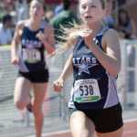 Photo by Joey Klecka/Peninsula Clarion Soldotna senior Daisy Nelson (538) races down the finishing stretch of the 4A girls 400-meter dash Saturday at the state track and field championships at Dimond Alumni Field in Anchorage.