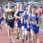 Photo by Joey Klecka/Peninsula Clarion Seward runner Hunter Kratz (501) races with a pack of contenders, including leader Kaleb Korta of Galena, in the 1-2-3A boys 1,600-meter race Saturday at the state track and field championships at Dimond Alumni Field in Anchorage.