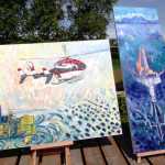 Louise Nutter's paintings of the XTO A oil platform (left, now owned by Hilcorp) and Furie Energy's Julius R platform stand on the deck of her house on Wednesday, June 1 in Nikiski. 10 platforms, including the A and the Julius, are visible from the deck where Nutter sometimes works. Her platform paintings are based on photographs she took while flying over Cook Inlet.