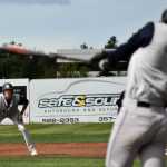 Photo by Joey Klecka/Peninsula Clarion Soldotna senior Joey Becher watches intently while teammate Brandon Crowder swings at a pitch, Friday at the state baseball tournament at Mulcahy Field in Anchorage.