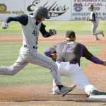 Photo by Joey Klecka/Peninsula Clarion Soldotna sophomore Caleb Spence (4) isn't able to reach first base before the throw Friday against Lathrop at the state baseball tournament at Mulcahy Field in Anchorage.