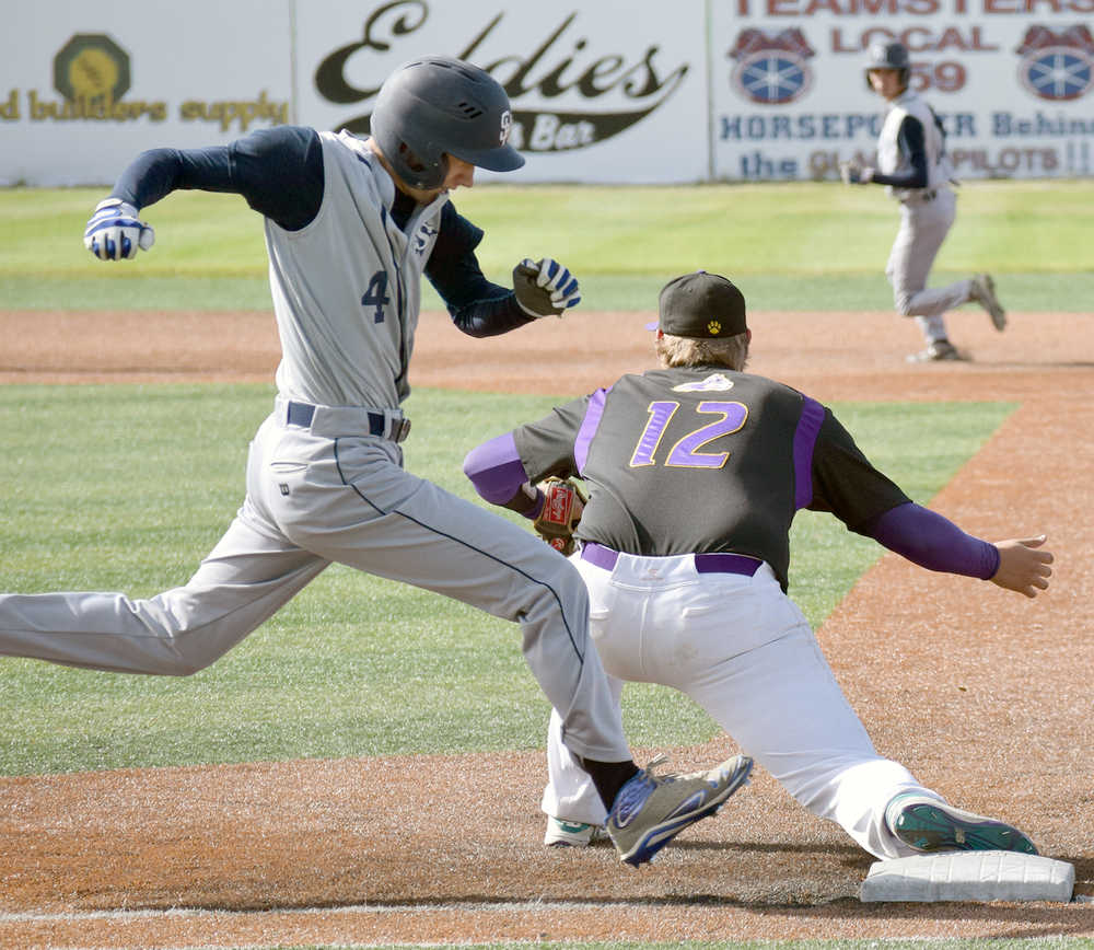 Photo by Joey Klecka/Peninsula Clarion Soldotna sophomore Caleb Spence (4) isn't able to reach first base before the throw Friday against Lathrop at the state baseball tournament at Mulcahy Field in Anchorage.