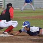Photo by Joey Klecka/Peninsula Clarion Peninsula Oilers first baseman Shih-Tsung Wang just misses the tag on Anchorage Glacier Pilots left fielder R.J. Cordeiro, Friday evening at Coral Seymour Memorial Park in Kenai.