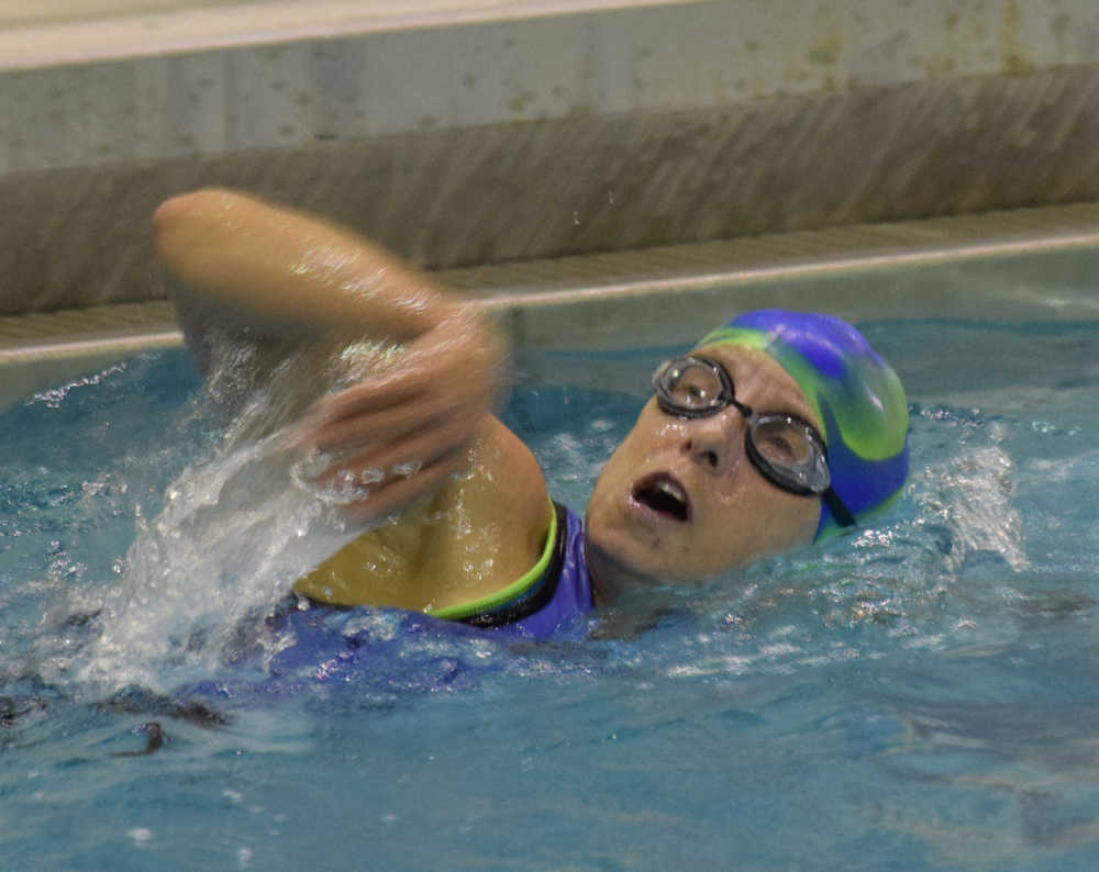Photo by Jeff Helminiak/Peninsula Clarion Patty Moran of Soldotna competes in the 500-yard swim during the Sprint competition at Tri the Kenai at Skyview Middle School on Sunday.