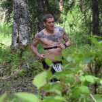 Photo by Jeff Helminiak/Peninsula Clarion Mike Crawford of Kenai does the 5-kilometer run portion of Tri the Kenai on Sunday at the Moose loop at Tsalteshi Trails.