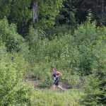 Photo by Jeff Helminiak/Peninsula Clarion Sprint competitor Ashley Tonione begins the second lap of the 5-kilometer run at Tsalteshi Trails on Sunday at the Tri the Kenai.