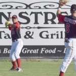 Photo by Joey Klecka/Peninsula Clarion Shih-Tsung Wang makes a throw from the outfield to Peninsula Oilers shortstop Jeff Chapuran June 14 against the Alaska Goldpanners of Fairbanks at Coral Seymour Memorial Field.