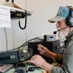 Members of the Moose Horn Amateur Radio club raise a portable antennae tower during ham Radio Feild Day on Saturday, June 25, 2016 at Skyview Middle School in Soldotna, Alaska. Members of the club spent 24 hours working two transmitters from their trailer in the Skyview parking lot in a nation-wide competition to make the greatest number of contacts with other amateur radio operators.