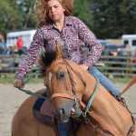 Photo by Joey Klecka/Peninsula Clarion Wasilla rider Andrea Jennings guides her horse through a barrel course June 25 at the Soldotna rodeo grounds.