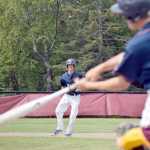 Photo by Joey Klecka/Peninsula Clarion Post 20 Twins third baseman Tyler Covey keeps an eye on teammate Cody Quelland's bat Thursday afternoon at the Kenai Little League fields.