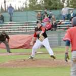 Photo by Jeff Helminiak/Peninsula Clarion Oilers starter Billy Oxford works out of a jam in the sixth inning against the Chugiak Chinooks on Friday at Coral Seymour Memorial Park in Kenai.