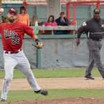 Photo by Jeff Helminiak/Peninsula Clarion Oilers third baseman Alex Seifert retires Tim Millard of the Chinooks in the third inning Sunday at Coral Seymour Memorial Park in Kenai.