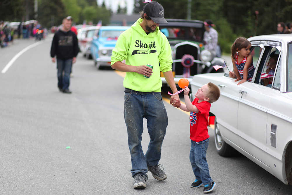 Photo by Kelly Sullivan/ Peninsula Clarion Some walked, some drove through Kenai's July 4th parade Monday, July 4, 2016 in Kenai, Alaska.