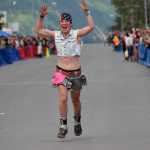Photo by Jeff Helminiak/Peninsula Clarion Seward's Aubrey Smith summons a little energy before a seventh-place finish Monday in the women's Mount Marathon race in Seward.