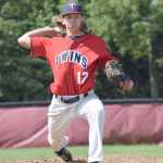 Photo by Joey Klecka/Peninsula Clarion Post 20 Twins pitcher J.J. Sonnen winds up for the throw against Tennessee Post 19 in Thursday's championship matchup of the Bill Miller Big Fish Wood Bat tournament at the Kenai Little League fields.