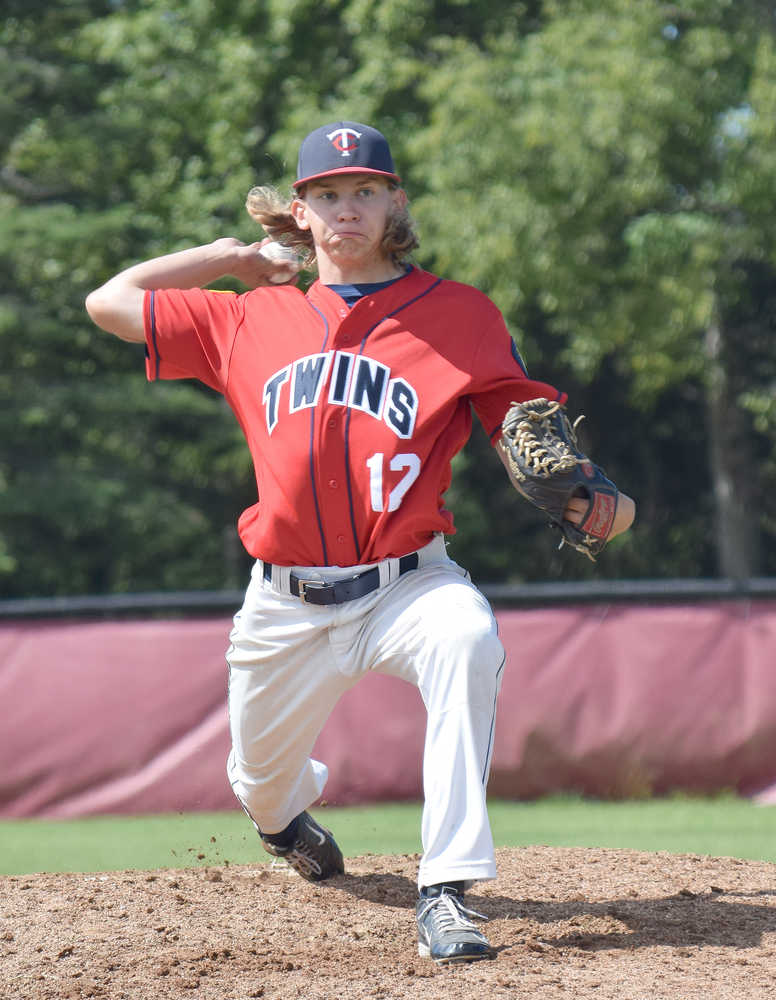 Photo by Joey Klecka/Peninsula Clarion Post 20 Twins pitcher J.J. Sonnen winds up for the throw against Tennessee Post 19 in Thursday's championship matchup of the Bill Miller Big Fish Wood Bat tournament at the Kenai Little League fields.