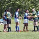 Photo by Jeff Helminiak/Peninsula Clarion Members of the Kenai River Wolfpack (in green) and the Manu Bears share postgame handshakes and hugs at the Kenai Dipnet Fest Rugby 10s Tournament on Saturday in Kenai.