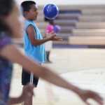 Photo by Kelly Sullivan/ Peninsula Clarion Romeo Prietto looks for a target for his dodgeball Thursday, July 14, 2016 at the Kenai Boys and Girls Club clubhouse in Kenai, Alaska.