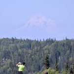 Photo by Jeff Helminiak/Peninsula Clarion Jack Newell of Eagle River hits into the 13th green Tuesday during the Birch Ridge Jr Masters at Birch Ridge Golf Course in Soldotna.