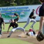 Photo by Jeff Helminiak/Peninsula Clarion Trey Dawson steals second base in front of Bucs second baseman Hunter Kasuls on Thursday at Coral Seymour Memorial Park in Kenai.