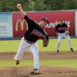 Photo by Jeff Helminiak/Peninsula Clarion Peninsula Oilers starter Hasten Freeman delivers home during the first inning Thursday at Coral Seymour Memorial Park in Kenai.