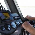 Photo by Megan Pacer/Peninsula Clarion Members of the Kenai Fire and Kenai Police Departments perform the first no-wake patrol of the dipnet season Tuesday, July 19, 2016 on the Kenai River. Using the fire department's patrol boat which is now affixed with a hose for firefighting capabilities, officers make sure dipnetters obey the no-wake zone rules during high tides throughout the season, and give out warnings and citations when necessary.