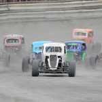 Photo by Joey Klecka/Peninsula Clarion A 10-car field of Legends machines rounds the second turn at Twin City Raceway Saturday afternoon in Kenai.