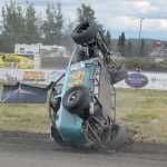 Photo by Joey Klecka/Peninsula Clarion Legends driver Ty Torkelson goes for a wild ride Saturday at Twin City Raceway in Kenai. Torkelson got out of his car and walked away.