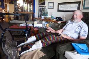 Photo by Megan Pacer/Peninsula Clarion Bill Parker talks to his wife, Shoney, in their bluff-side home Thursday, July 21, 2016 in Happy Valley, Alaska. After years of struggling to get services and medical care through the Department of Veterans Affairs, Parker said things are running more smoothly since he enrolled in the Veteran-Directed Home and Community Based Services Program, offered for the first time in Alaska through the Independent Living Center of the Kenai Peninsula.