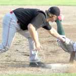Peninsula first baseman Jonathon Washam tags Mat-Su's Angelo Armenta at first during a 3-2 win over the Miners Thursday, Aug. 3, 2016, at Hermon Brothers Field in Palmer. Armenta was ruled out on the play.