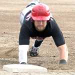 Peninsula's Trey Dawson slides back into first safely during a 3-2 win over the Mat-Su Miners Thursday, Aug. 3, 2016, at Hermon Brothers Field in Palmer.