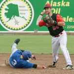 Photo by Jeff Helminiak/Peninsula Clarion Oilers shortstop Alex Seifert forces out Pilots center fielder Dalton Hurd on Friday in a first-round Top of the World Series game at Coral Seymour Memorial Park in Kenai.