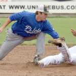 Photo by Jeff Helminiak/Peninsula Clarion Brody Wofford successfully steals second base in the seventh inning as Pilots shortstop Kyle Watson tries to tag him out Friday in a Top of the World Series semifinal at Coral Seymour Memorial Park in Kenai.