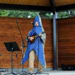 Photo by Elizabeth Earl/Peninsula Clarion Dan Pascucci, the education specialist for the Kenai Watershed Forum, treats the crowd to a rendition of "Sea Stars Are Not Starfish" on Friday, Aug. 5, 2016 at Soldotna Creek Park in Soldotna, Alaska. After 10 years, Pascucci will leave his position with the local conservation organization to take a job in Kentucky.