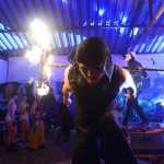 Photo by Megan Pacer/Peninsula Clarion Shane Borth, a violinist and composer for Quixotic, plays during the group's performance Sunday, Aug. 7, 2016 at Salmonfest in Ninilchik, Alaska. Quixotic is a cirque nouveau that blends live music with dance, lights and other performance art.