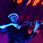 Photo by Megan Pacer/Peninsula Clarion Ken Hill, a fire artist with Quixotic, performs poi during the group's set Sunday, Aug. 7, 2016 at Salmonfest in Ninilchik, Alaska. Quixotic is a cirque nouveau that blends live music with dance, lights and other performance art.