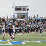 Photo by Jeff Helminiak/Peninsula Clarion Soldotna's Aseli Finau congratulates Andy West after his fourth-quarter touchdown Friday at Justin Maile Field in Soldotna. The Stars won 49-30.