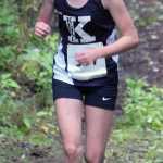 Photo by Jeff Helminiak/Peninsula Clarion Kenai Central sophomore Jaycie Calvert finishes off her victory in the freshmen-sophomore girls race Monday at the Nikiski Class Races at Nikiski High School.