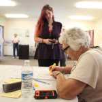 Photo by Kelly Sullivan/ Peninsula Clarion Leslie Meyer waits in line to vote Tuesday, Aug. 16, 2016 at the Central Emergency Services Station 6 in Kasilof, Alaska.