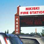 Photo by Elizabeth Earl/Peninsula Clarion A sign advises voters where to stop in to cast their ballot during the primary election Tuesday, Aug. 16, 2016 at Nikiski Fire Station 1 in Nikiski, Alaska.