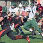 Photo by Jeff Helminiak/Peninsula Clarion Service's Xavier Harris runs for a touchdown Friday at Ed Hollier Field in Kenai.