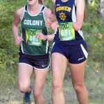 Photo by Jeff Helminiak/Peninsula Clarion Homer's Megan Pitzman leads Colony's Jill Bowker a little over two kilometers into the Tsalteshi Invitational at Tsalteshi Trails on Saturday.