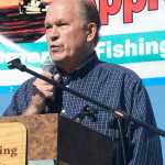 Photo by Megan Pacer/Peninsula Clarion Attendees of Industry Appreciation Day applaud Gov. Bill Walker during his visit Saturday, Aug. 27,2016 in Kenai, Alaska. Walker is making stops across the state to speak about Alaska's fiscal situation.