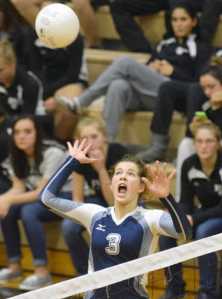 Photo by Jeff Helminiak/Peninsula Clarion Soldotna's Ella Stenga attacks against Kenai Central on Saturday in Nikiski in the final of the ninth annual Shayna Pritchard Memorial Volleyball Tournament.